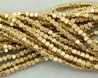 220 Rounded Cube Brass Spacer Beads. 3mm with 1.5mm Hole 214 Beads on 24" Strand SKU-MB-52-B