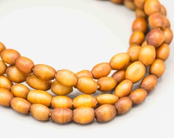 50 African Oval Bone Beads from Nigeria. CAMEL-4