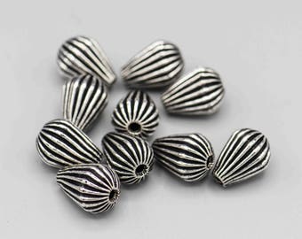Silver Plated Copper Beads Ribbed Teardrop 14x10mm 2mm Hole 10 Beads SKU-FMB-14