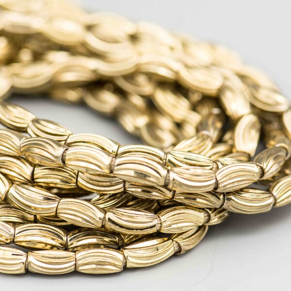 Patterned Brass Rice 10x5mm Spacer Beads SKU-MB-108-B