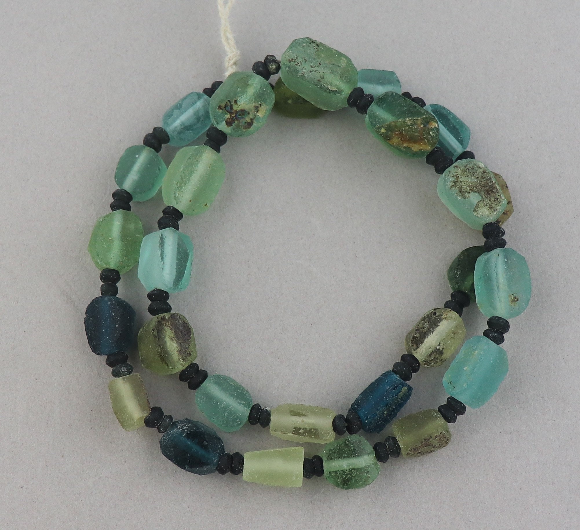 Strand of Roman Glass Beads, Coins