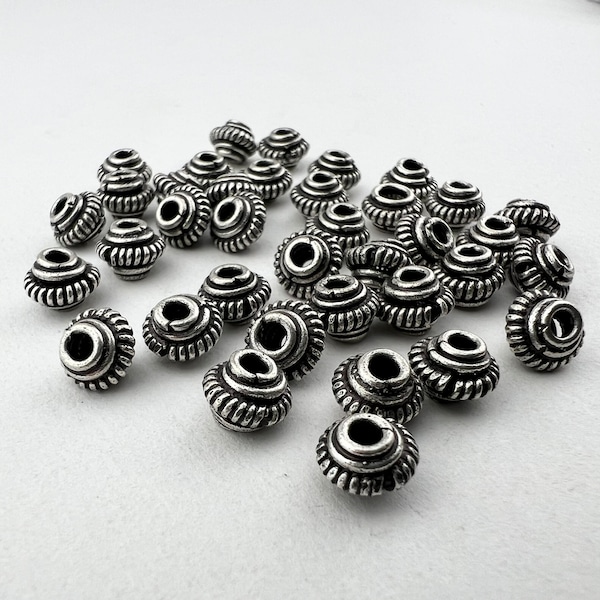 36 Bali Stle Silver Plated Beads. FMB-163