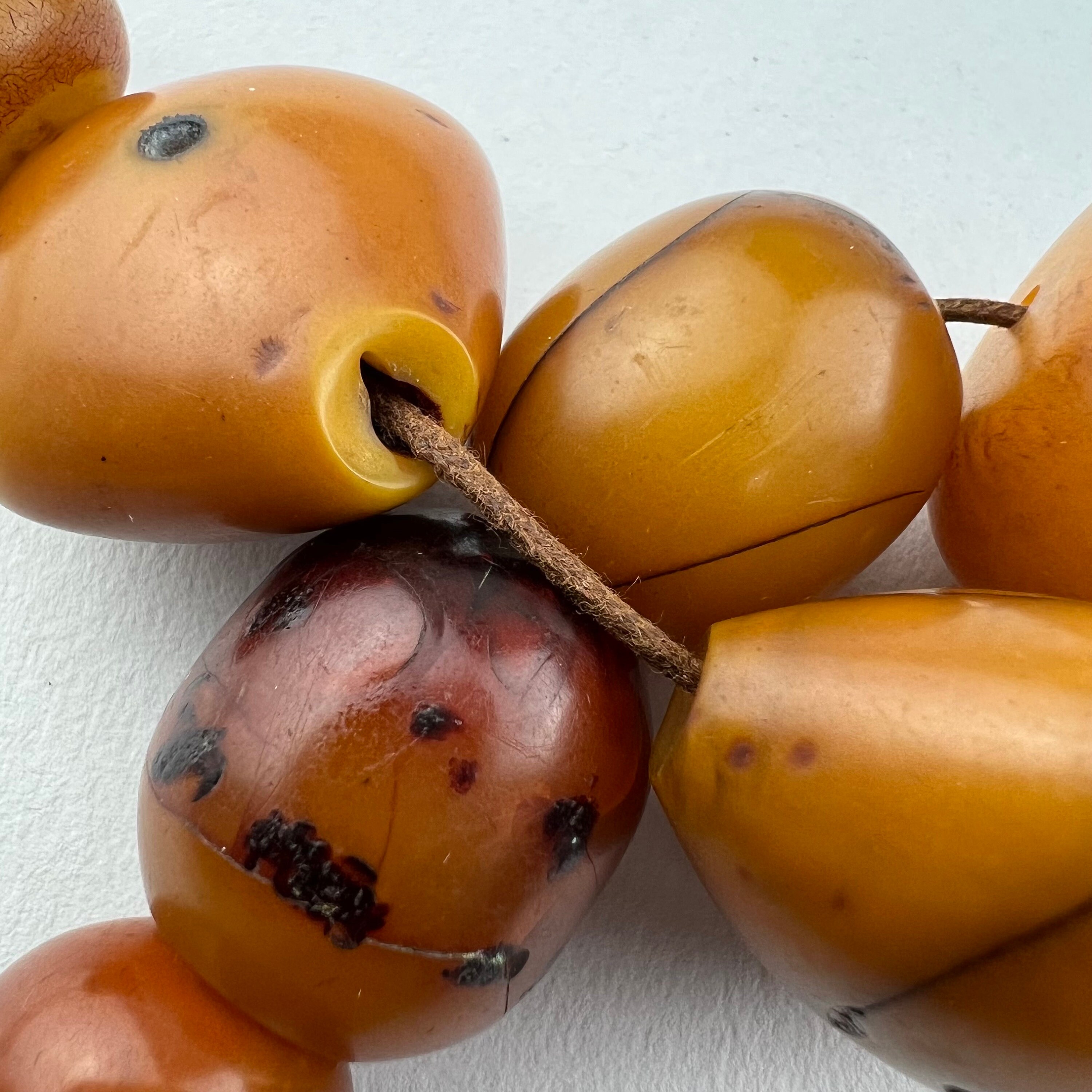 14 Antique “copal” Amber Beads. Large African “amber” Beads