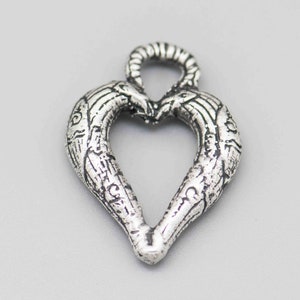 Antique Silver Winged Heart Pendant. SKU-PEN-105