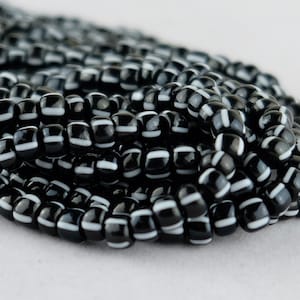 150 Striped Glass Seed Beads. Chevron 5mm black and white stripe beads. SKU-SB-21