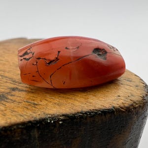 Ancient Tibetan Pema Raka Carnelian Bead. TB-4960