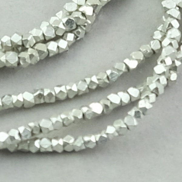 220 diamond cut Silver Beads. Faceted 2 to 2.5mm Metal Silver Beads 220 beads. MB-53-S