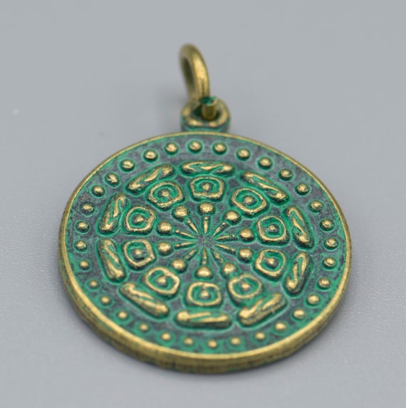 1 Green Patina Brass Buddhist Prayer patinated brass and green glass bead