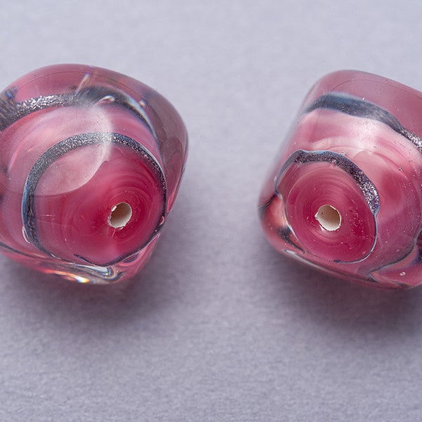 Pair Czech Lampwork Beads. Pink with Bronze Swirl and Clear Casing. CZ-57