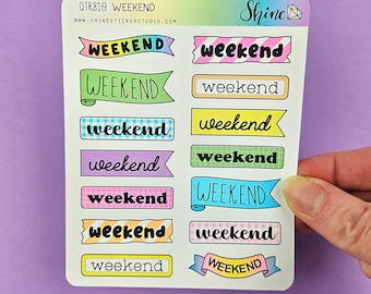 May include: A sheet of colorful stickers with the word "weekend" written in different styles and colors. The stickers are on a white background with a light blue border. The text "QTR810 WEEKEND" and "WWW.SHINESTICKERSTUDIO.COM" is at the top of the sheet. The word "Shine" is in a sparkly font at the top right corner of the sheet.