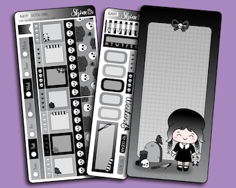 May include: A set of black and white planner stickers with a gothic theme. The stickers feature skulls, roses, spiders, and a cute goth girl. The stickers are designed for use in a planner or journal.