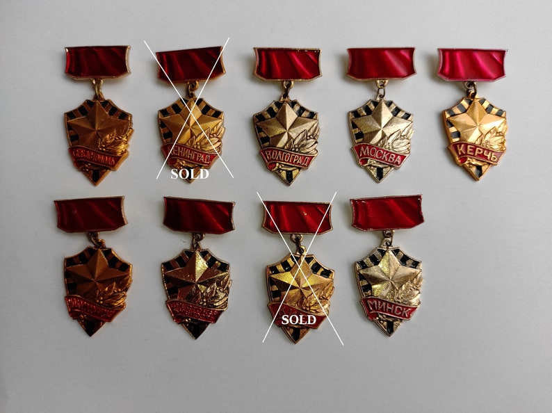 propaganda Soviet cities pin soviet badges WW2 cities badges historical evidence Soviet propaganda badges Hero City pins