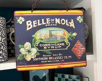 VINTAGE METAL SIGNS Southern New Orleans Tin Sign, Wall Decor Food Label, “Belle of Nola” Corn and Cane Syrup.