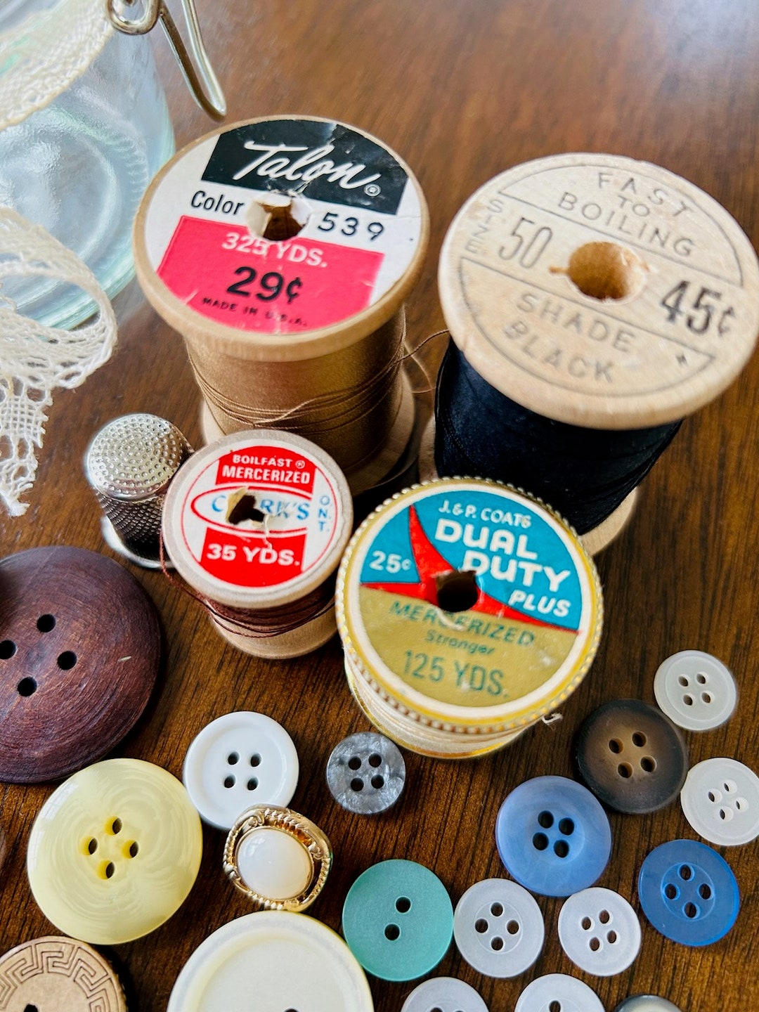 Vintage Spools of Thread, Antique Buttons, and Thimble in a Glass Jar ...