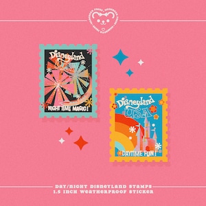 May include: Two colorful Disneyland-themed stickers on a pink background. One features a nighttime scene with the text "Night Time Magic!" The other shows a daytime scene with "Daytime Fun!" and "USA." Each sticker is 1.5 inches.