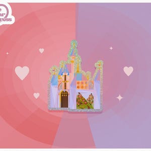 May include: A castle pin with glitter detailing, featuring blue turrets, gold spires, and a floral design. The pin is set against a pink and purple gradient background with heart and star shapes. The text "Mare Bear Press" is in the upper left corner.