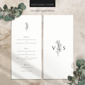 May include: A double-sided wedding menu template with a floral design. The front side features a menu with the headings "Starter", "Main", and "Dessert". The back side features the initials "VS" with a floral design.