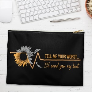 May include: Black zippered pouch with a sunflower and EKG graphic. The text reads "Tell me your worst... I'll send you my best."