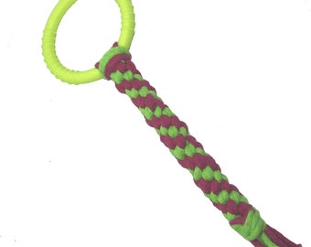 A cotton tug toy with  wheel cord and mint scent