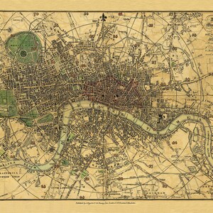 Peut inclure: Une carte ancienne de Londres, en Angleterre, imprim&eacute;e &agrave; l'encre brune et noire sur du papier cr&egrave;me. La carte montre les rues, les rivi&egrave;res et les monuments de la ville, notamment Regent's Park, la Tamise et l'Isle of Dogs. La carte est intitul&eacute;e "Pigot & Co.'s Miniature Plan of London & County".
