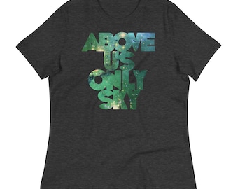May include: A dark heather grey t-shirt with a galaxy print design. The text "ABOVE US ONLY SKY" is printed on the shirt in a bold, white font.