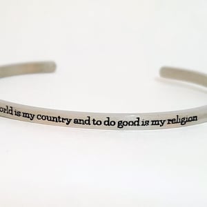 Atheist Humanist Thomas Paine, "The world is my country and to do good is my religion." cuff bracelet