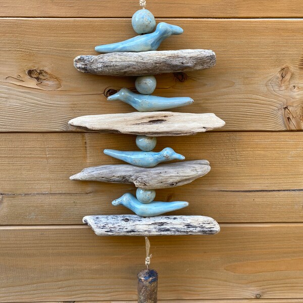 This handmade bird wind chime is a wonderful addition to any home/garden. Great for anyone who loves birds!  It would make very unique gift