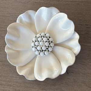 Large white metal enamel flower brooch with  white milk glass rhinestones - estate find - 2 and 3/4” across