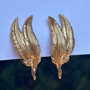 Vintage Monet signed gold tone textured feather clip on earrings - unique clip system - read description