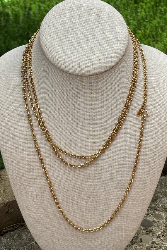 Vintage Monet signed long 56” gold tone  chain lin