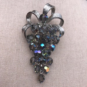 Vintage Park Lane faceted AB crystal cascading bead silver tone bow brooch with pendant hook