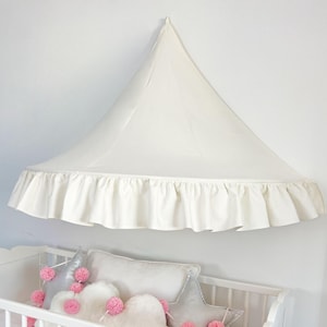 May include: A set of three ceramic mugs with a speckled, matte finish in cream, light grey, and dark grey. Each mug has a simple, minimalist design, suitable for coffee or tea.