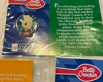 Set of 5 - Betty Crocker 2002 Olympic (Salt Lake) pins.  New in packaging