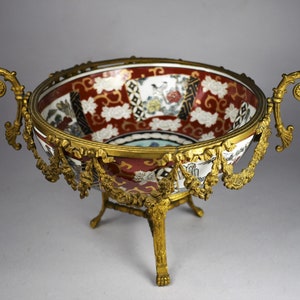 Old chinese ceramic bowl with european frame