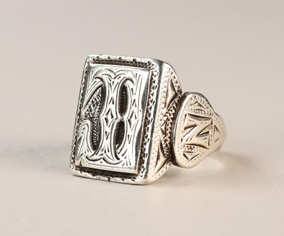 Solid High-Grade Silver Ring with Stylized Letters - image 1