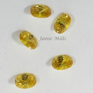 Yellow Topaz Zirconia Faceted oval gemstone  6x8mm 8x10mm 10x14mm or 13x18mm