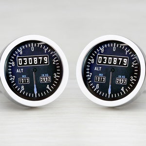 round cufflinks finished in stainless steel with a personalised insert showing an airplane altimeter design which is personalised with 6 digits in the altitude section. The 6 digits can be the date of a birthday, anniversary or special occasion.
