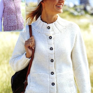May include: A white knitted cardigan with a button-up front and two patch pockets. The cardigan has a ribbed collar and cuffs.