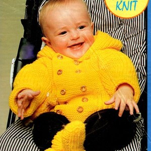 May include: A smiling baby wearing a yellow knitted hooded jumpsuit and matching booties. The text "Sunny Babe Easy To Knit" is printed on the image.