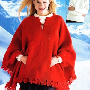 May include: A red knitted poncho with fringe trim. The poncho has a V-neck and a button closure. The model is wearing the poncho over a white turtleneck sweater.