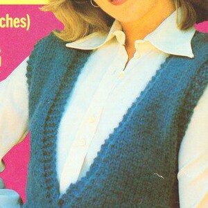 May include: A woman wearing a teal blue knitted vest over a white collared shirt. The vest has a deep V-neck design. The background is a vibrant pink with yellow text.