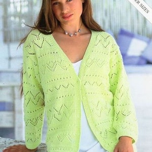 May include: A light green knitted cardigan with a V-neck and a delicate lace pattern. The cardigan is open in the front and has long sleeves.