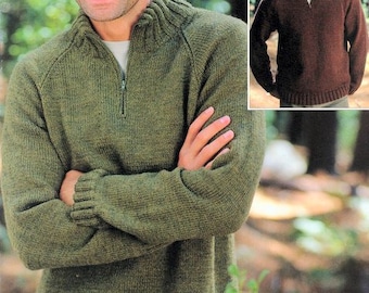 May include: A green knitted sweater with a zippered collar. The sweater has a ribbed hem and cuffs.