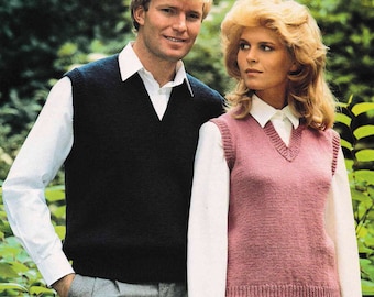 May include: A couple wearing matching knit vests. The man is wearing a white button-down shirt and gray pants. The woman is wearing a white button-down shirt and a plaid skirt. They are standing in a garden setting.