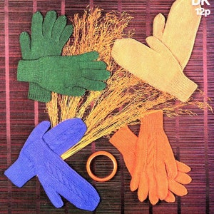 May include: Four pairs of knitted gloves in different colors: green, orange, blue, and beige. The gloves are arranged on a brown woven background with dried grass.