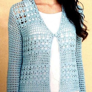May include: A light blue crocheted cardigan with a button closure. The cardigan has a delicate openwork pattern and long sleeves.