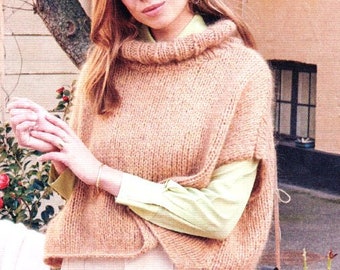 May include: A light brown knitted sweater with a high turtleneck and a loose, flowing fit. The sweater is made of a soft, textured yarn and has a relaxed, casual style.
