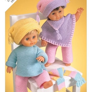 May include: Two knitted doll outfits in pink, yellow, blue, and purple. The outfits include a hat, sweater, pants, and a scarf. The text "EASY KNIT DESIGN" is visible in the top left corner of the image.