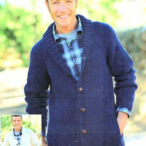 May include: A navy blue cardigan with a shawl collar and button closure. The cardigan is knitted and has a casual, relaxed fit.