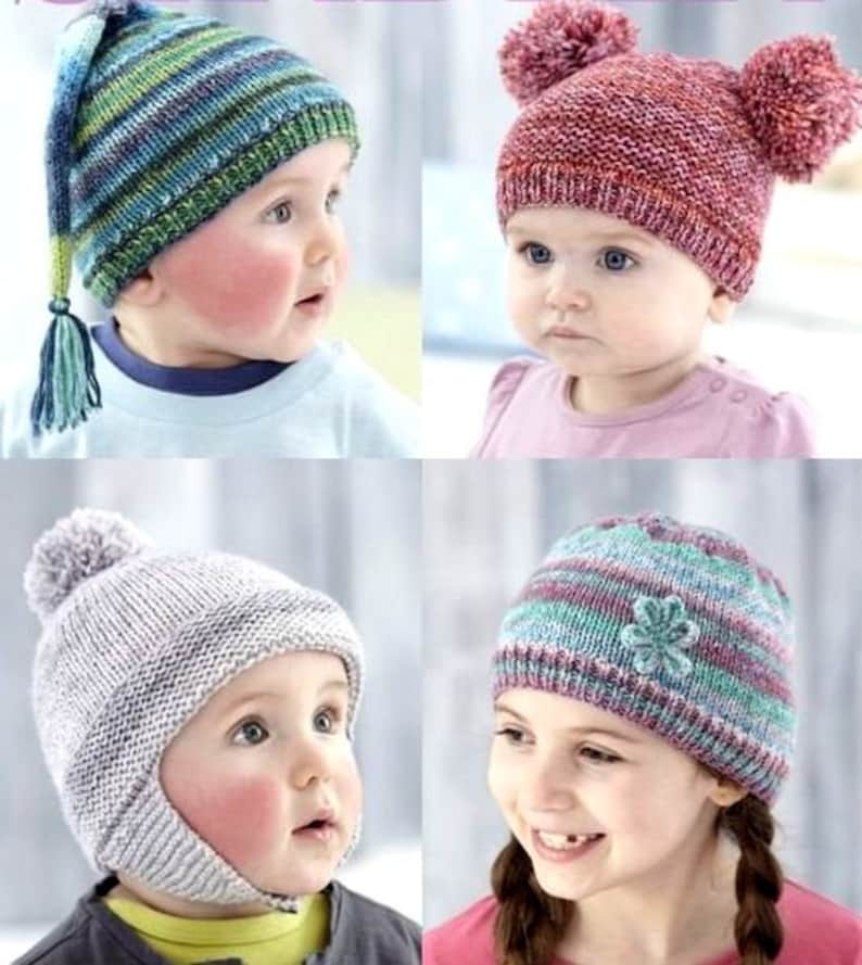 May include: Four children wearing different knitted hats. The hats are in various colours and styles, including a striped hat with a tassel, a hat with two pom-poms, a grey hat with a pom-pom and ear flaps, and a striped hat with a flower.